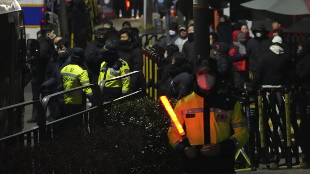 South Korean law enforcement officials enter presidential compound to detain impeached Yoon