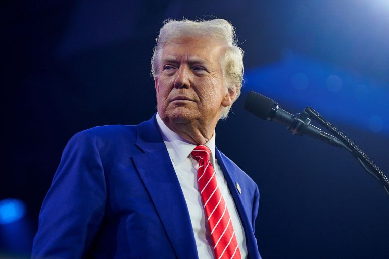 U.S. President-elect Donald Trump attends Turning Point USA's AmericaFest in Phoenix, Arizona, U.S., December 22, 2024. REUTERS/Cheney Orr