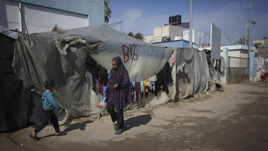 Qatar says ceasefire between Israel and Hamas will go into effect at 8:30 a.m. on Sunday