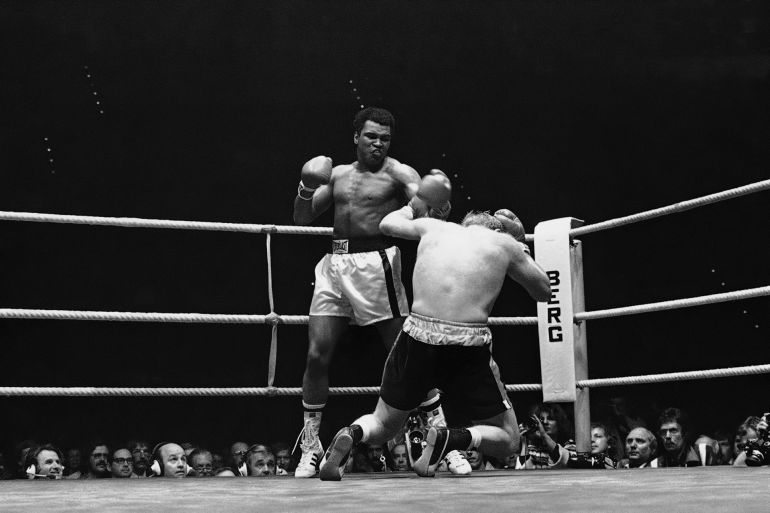 European heavyweight champion Richard Dunn of Great Britain falls to the canvas after receiving blow from world heavyweight champion Muhammad Ali in fifth round of title bout on Tuesday, May 25, 1976 at the Munich Olympic Hall. Ali was declared winner of the bout before the round ended. (AP Photo)