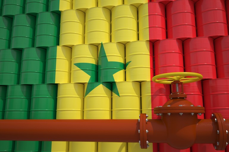 oil pipe and barrels with painted flag of senegal. petroleum industry related 3d rendering