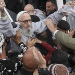 Middle East latest: Hamas frees 3 hostages, Israel releases Palestinians as part of ceasefire deal