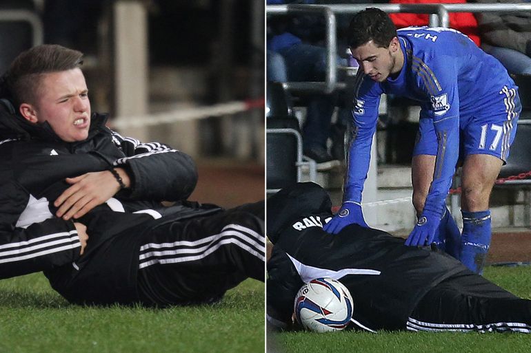 football - swansea city v chelsea - capital one cup semi final second leg - liberty stadium - 23/1/13 chelsea's eden hazard clashes with a ball boy during the game resulting in hazard being later sent off mandatory credit: action images / carl recine livepic editorial use only. no use with unauthorized audio, video, data, fixture lists, club/league logos or live services. online in-match use limited to 45 images, no video emulation. no use in betting, games or single club/league/player publications. please contact your account representative for